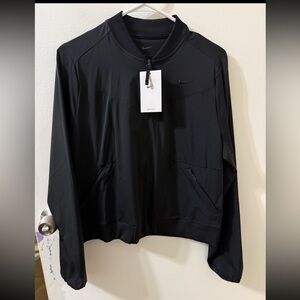 Nike dri-fit track style jacket. New with tags.